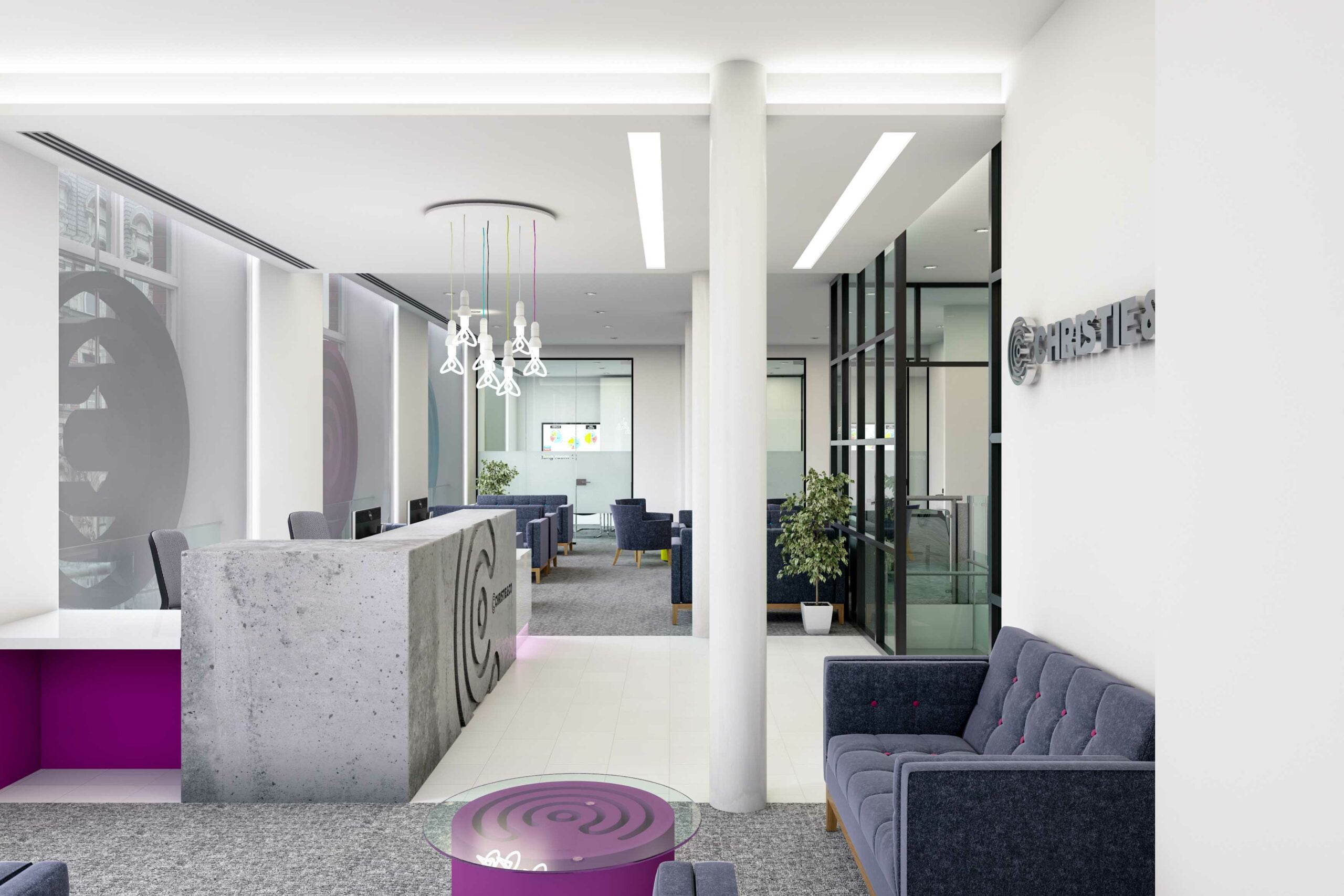 An office reception with purple accent features and grey furniture.