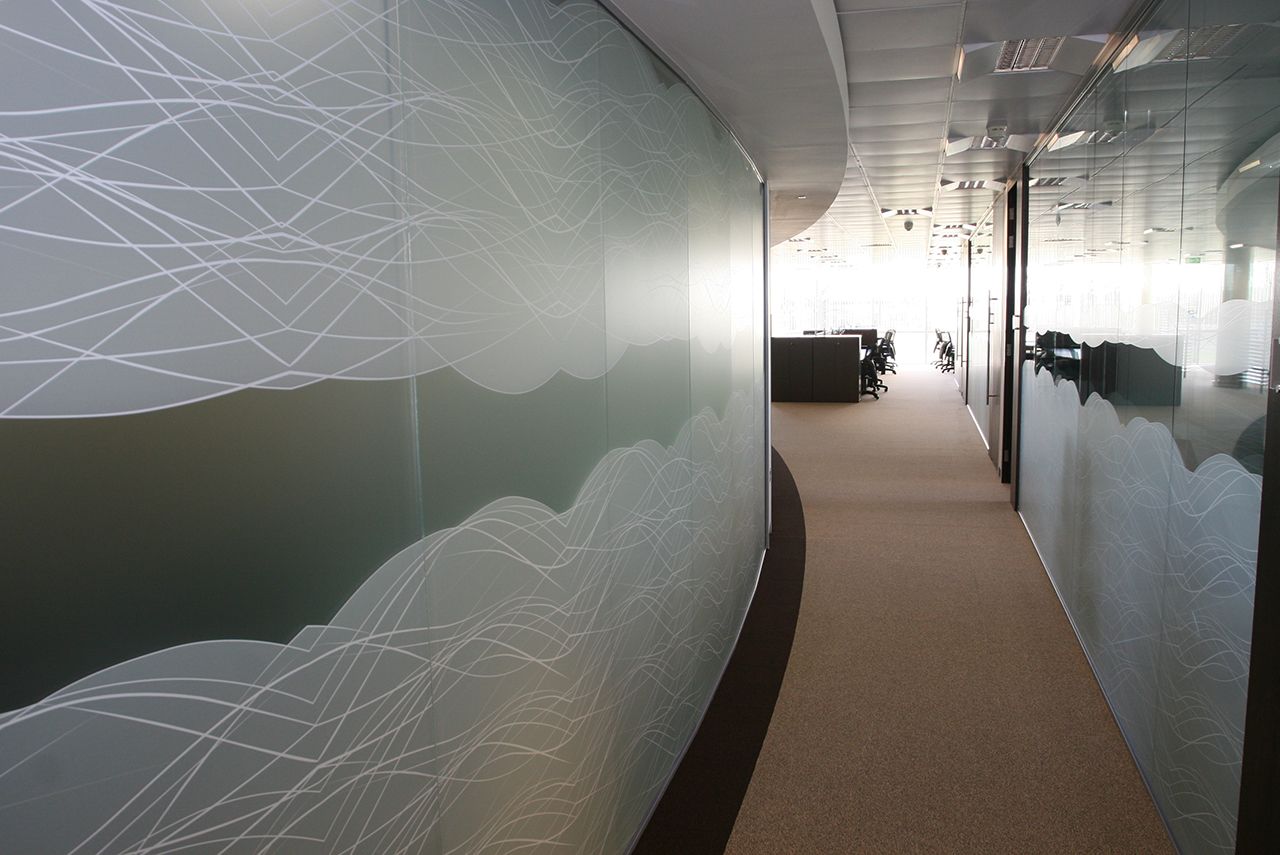 A custom-designed, frosted glass partition wall.