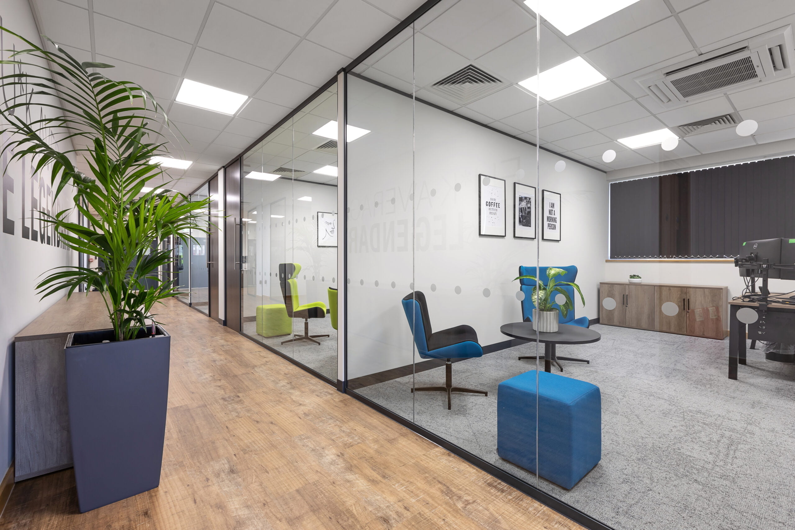 Pro FS individual glass offices with colourful seating area